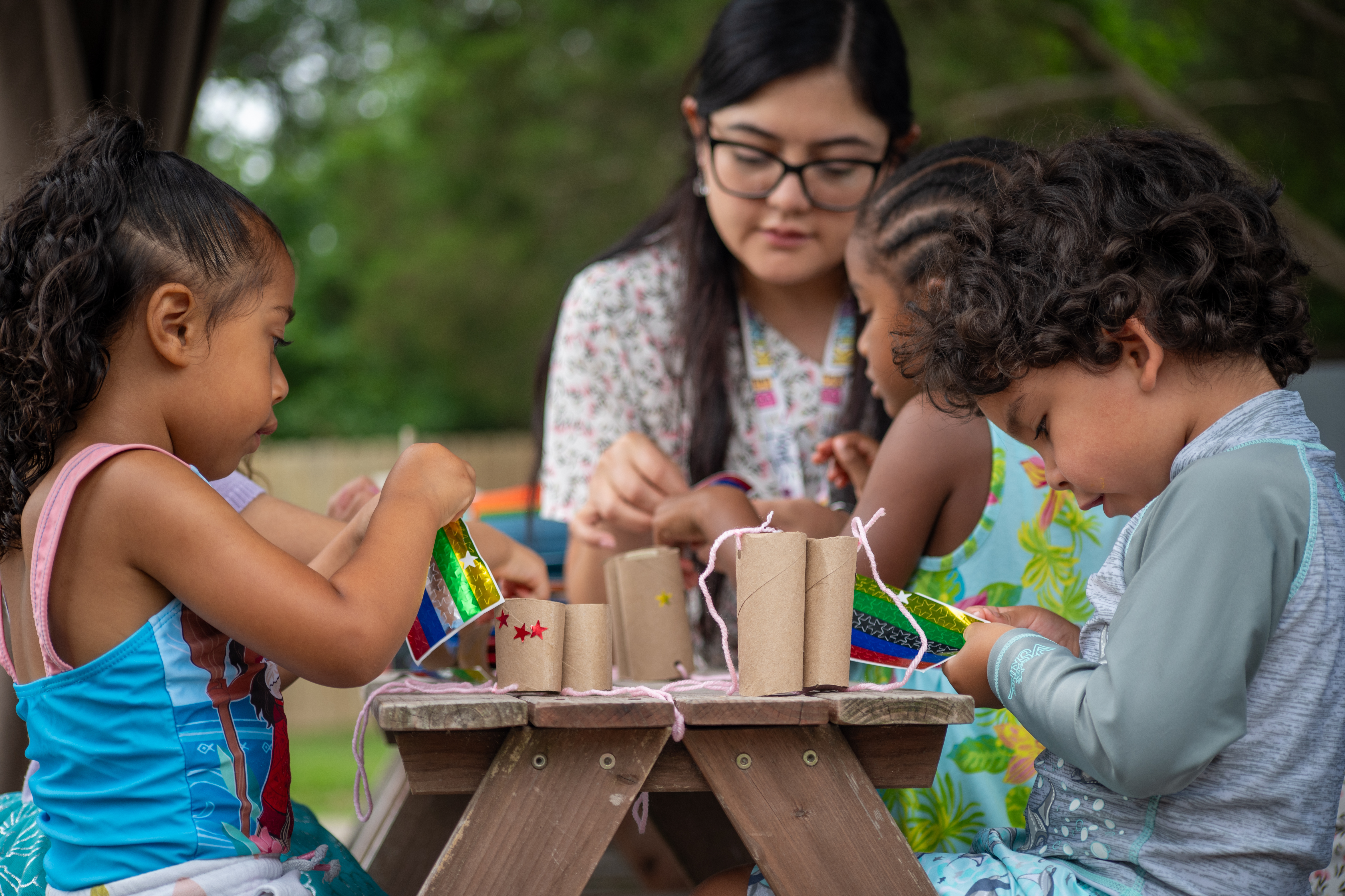 making binoculars with teacher